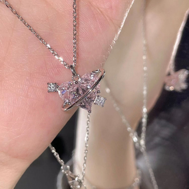 Saturne Pink Heart Orbital Pendant — Crystal Halo