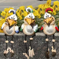 Three hand-painted resin garden birds
