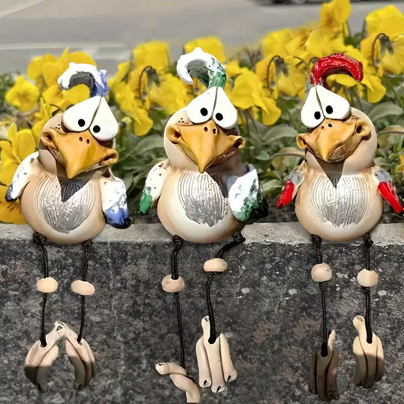 Three hand-painted resin garden birds