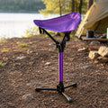QuickSit Air Seat in purple at a campsite